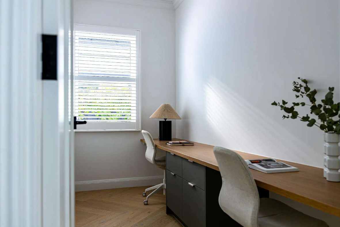 Home office renovation with built-in workspace